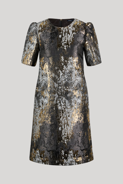 Leads to product detail page "Dress with puff sleeves in black, gold and silver pattern"