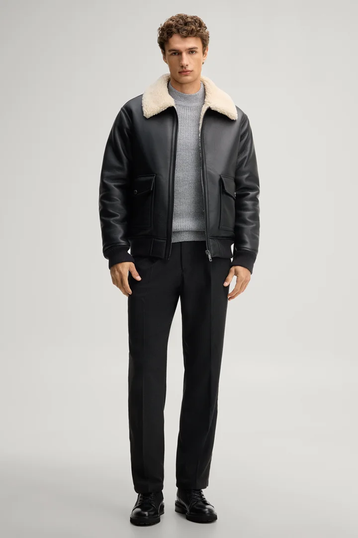 Leads to product detail page "Black vegan leather blouson"