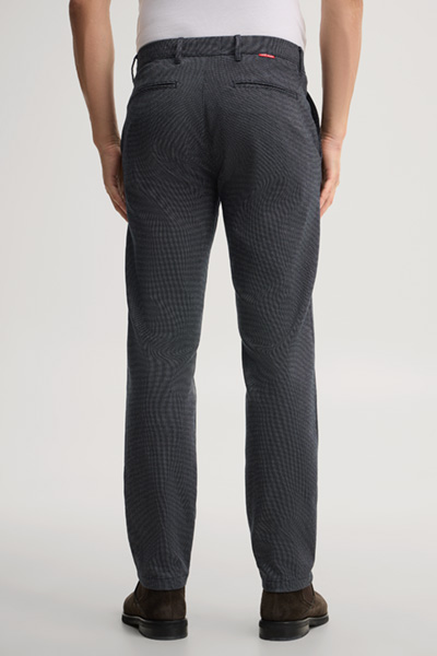 Leads to product detail page "Patterned navy chinos"