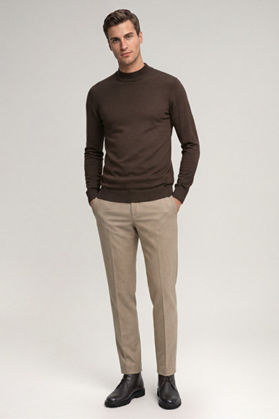 Leads to product detail page "Dark brown virgin wool crew-neck jumper"