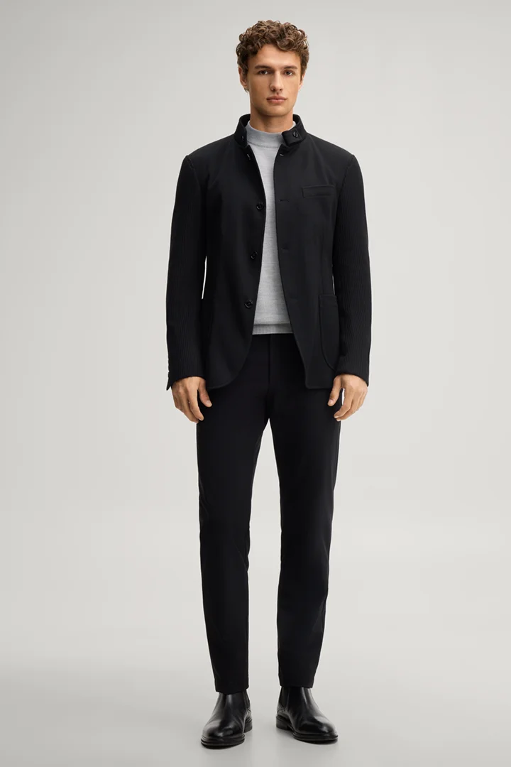 Leads to product detail page "Black suit jacket with a stand-up collar"