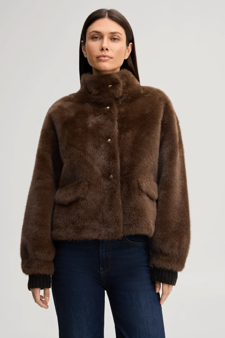 Leads to product detail page "Faux fur jacket with a stand-up collar in dark brown"