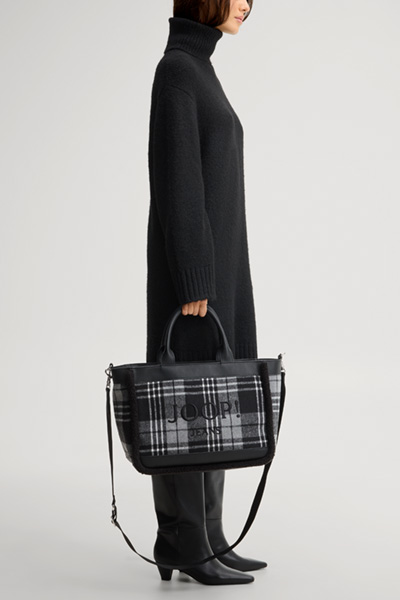 Leads to product detail page "Calduccio quadro yvette handbag in black and grey chequered pattern"