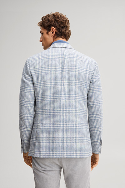 Leads to product detail page "Double-breasted suit jacket in a wool blend with a medium blue checked pattern"