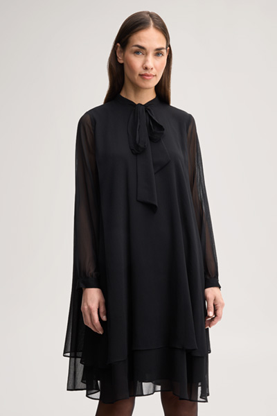 Leads to product detail page "Black chiffon dress with a bow tie"