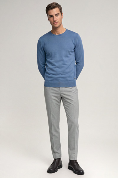 Leads to product detail page "Medium blue virgin wool jumper"