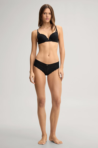 Leads to product detail page "Padded underwired bra in black with a pattern"
