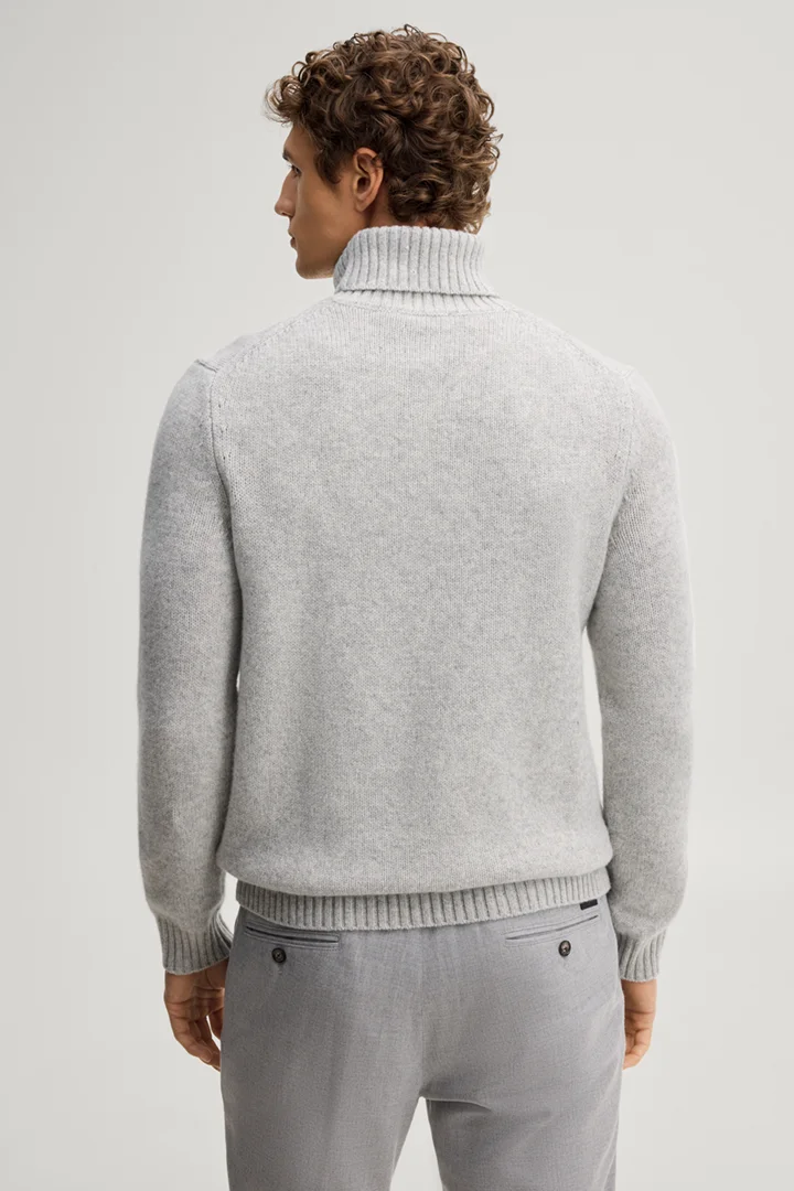 Leads to product detail page "Light grey woollen turtleneck jumper"