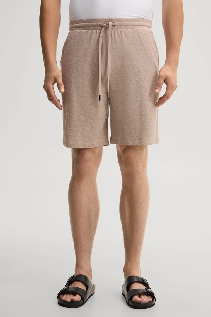 Leads to product detail page "Beige loungewear shorts"