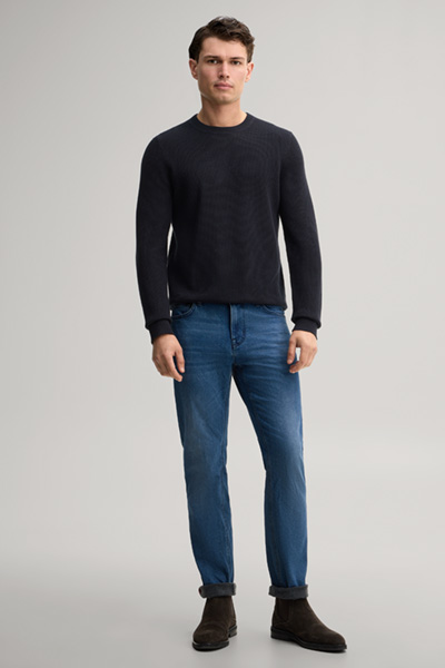 Leads to product detail page "Blue stretch five-pocket jeans"