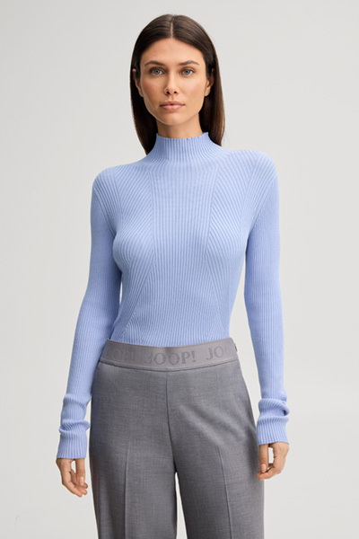 Leads to product detail page "Light blue viscose-blend jumper with a stand-up collar"