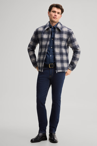 Leads to product detail page "Navy checked shirt jacket in a virgin wool blend"