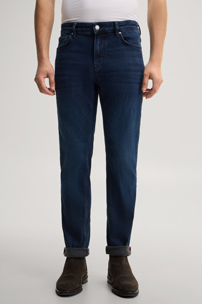 Leads to product detail page "Blue stretch five-pocket jeans"