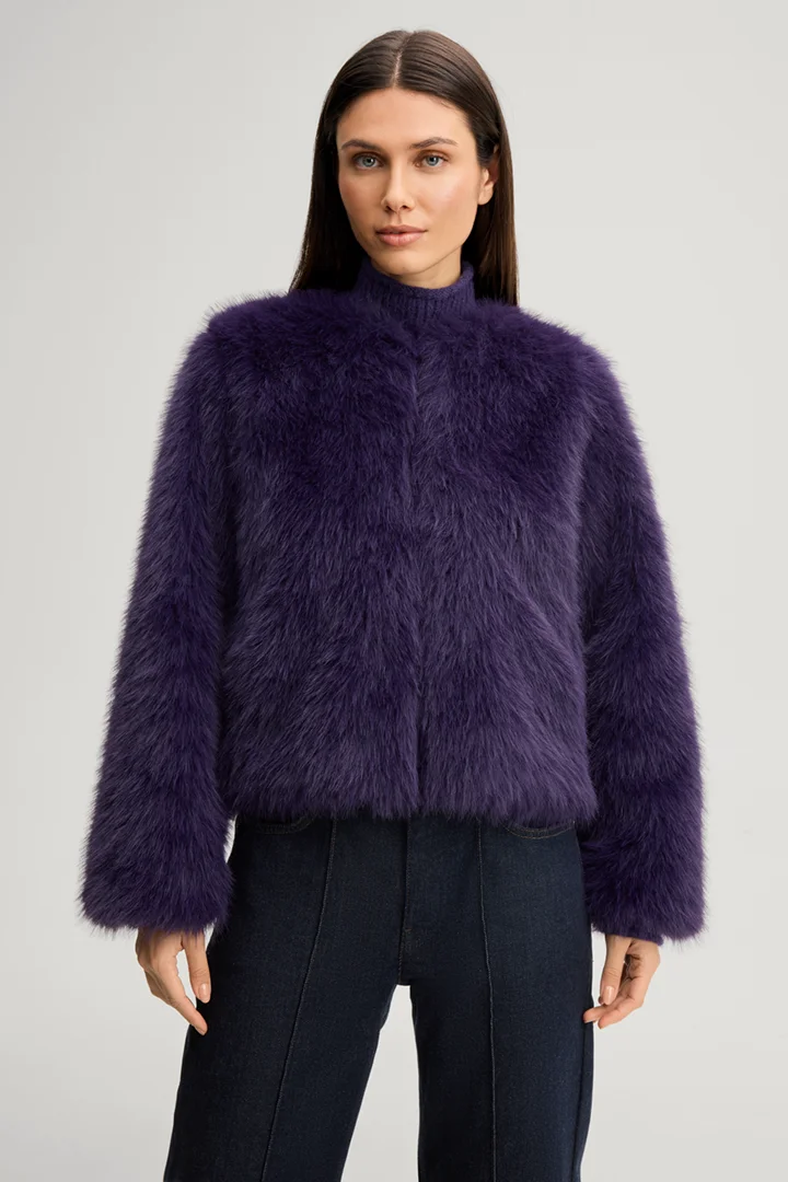 Leads to product detail page "Faux fur jacket in purple"