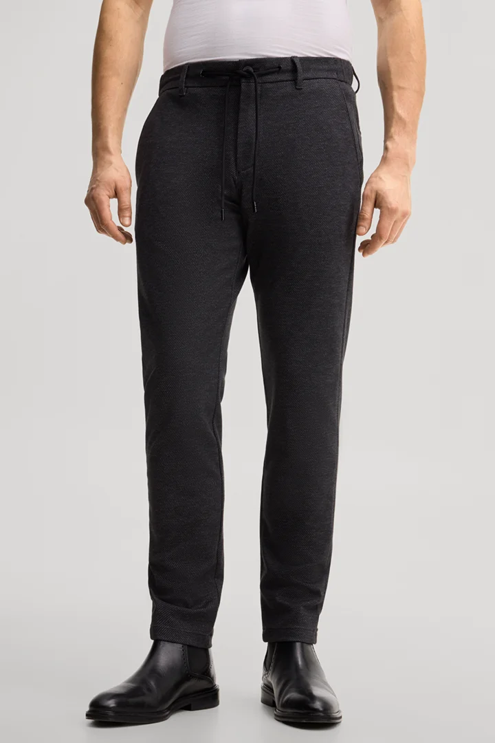 Leads to product detail page "Viscose-blend chinos in anthracite"