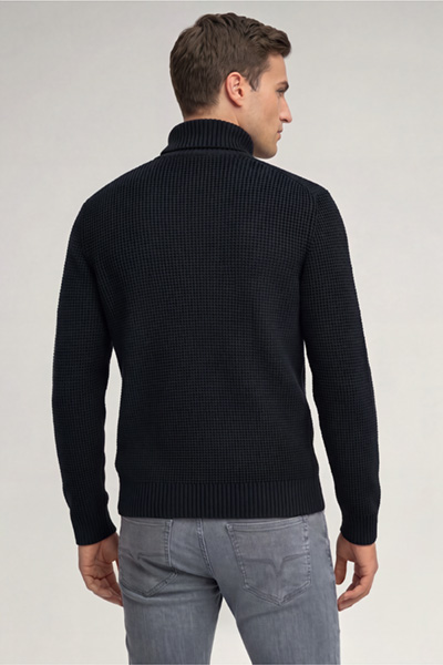 Leads to product detail page "Dark blue roll-neck jumper"