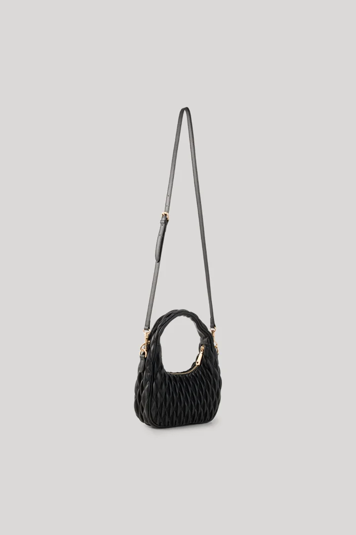 Leads to product detail page "Ruga denise hobo bag in black, quilted"