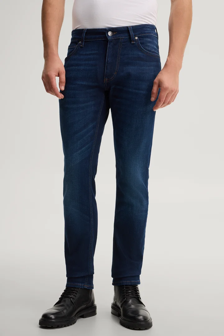 Leads to product detail page "Five-pocket stretch jeans in navy"