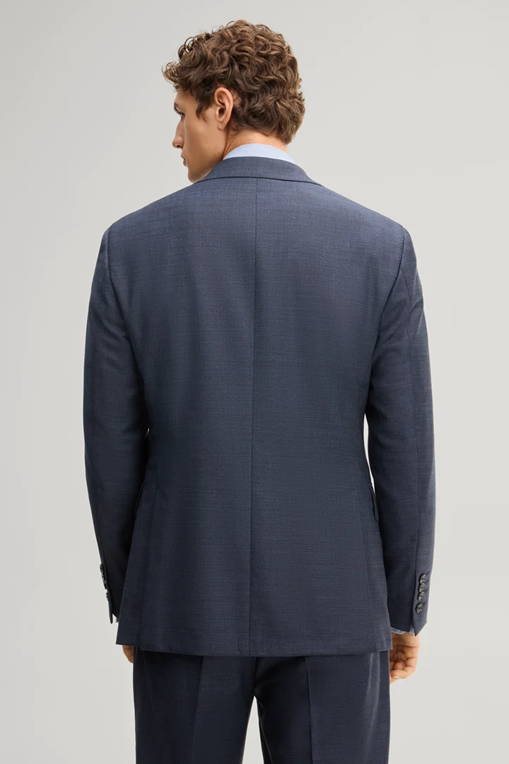 Leads to product detail page "Modular suit jacket in navy, made from virgin wool"