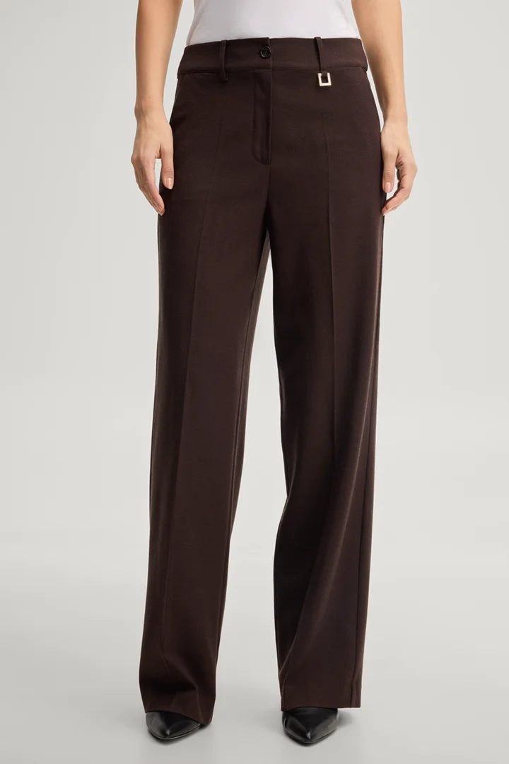 Leads to product detail page "Marlene trousers in dark brown"