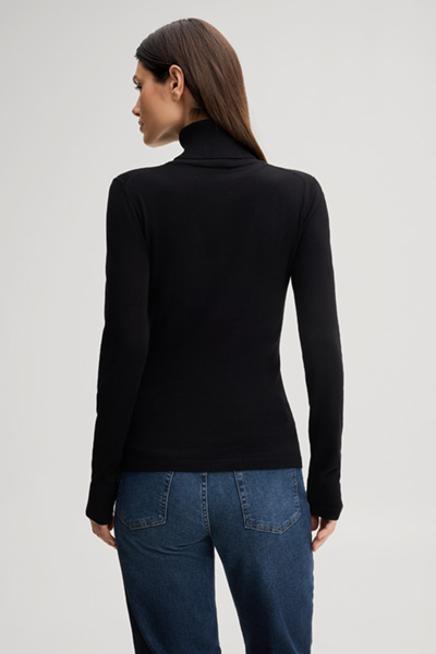 Leads to product detail page "Black viscose roll-neck jumper"