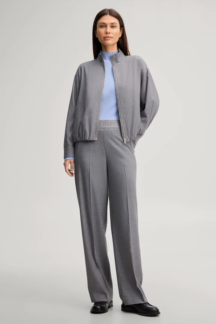 Leads to product detail page "Light blue viscose-blend jumper with a stand-up collar"