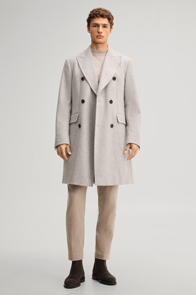Leads to product detail page "Double-breasted coat in a beige checked wool blend"
