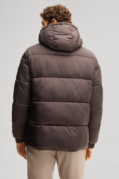 Leads to product detail page "Hooded quilted jacket in dark brown"
