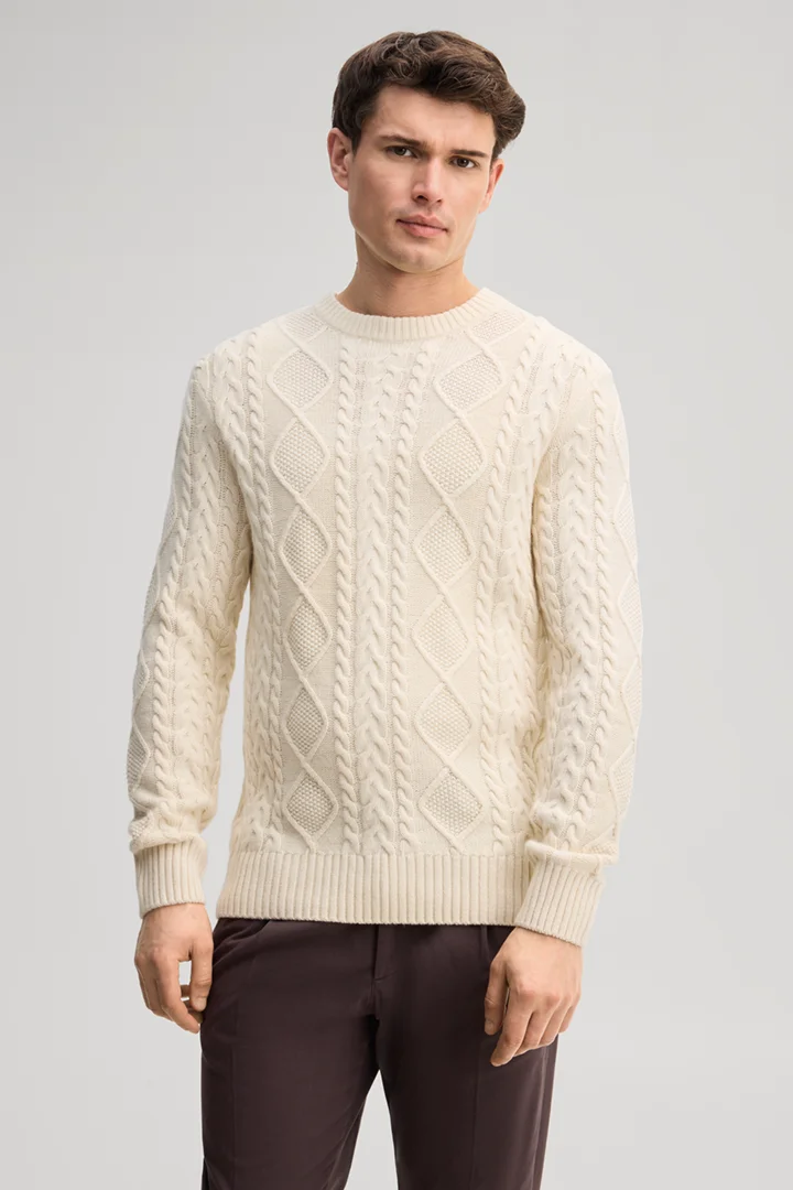 Leads to product detail page "Beige crew-neck jumper"