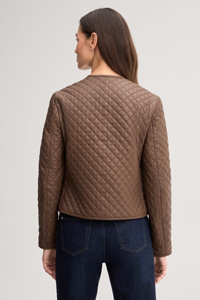 Leads to product detail page "Light brown quilted leather jacket"
