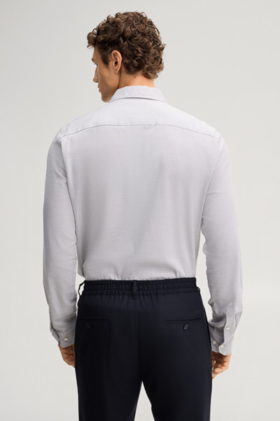 Leads to product detail page "Light grey cotton shirt"
