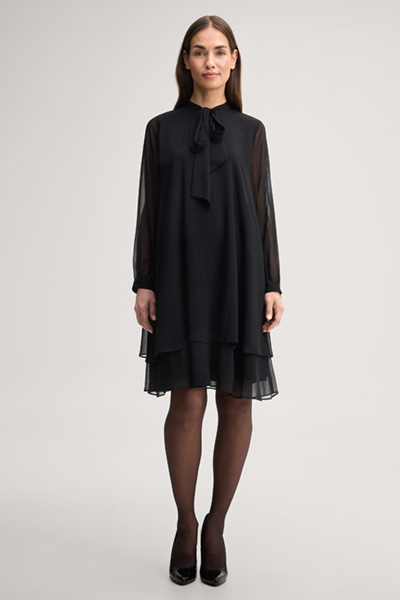 Leads to product detail page "Black chiffon dress with a bow tie"