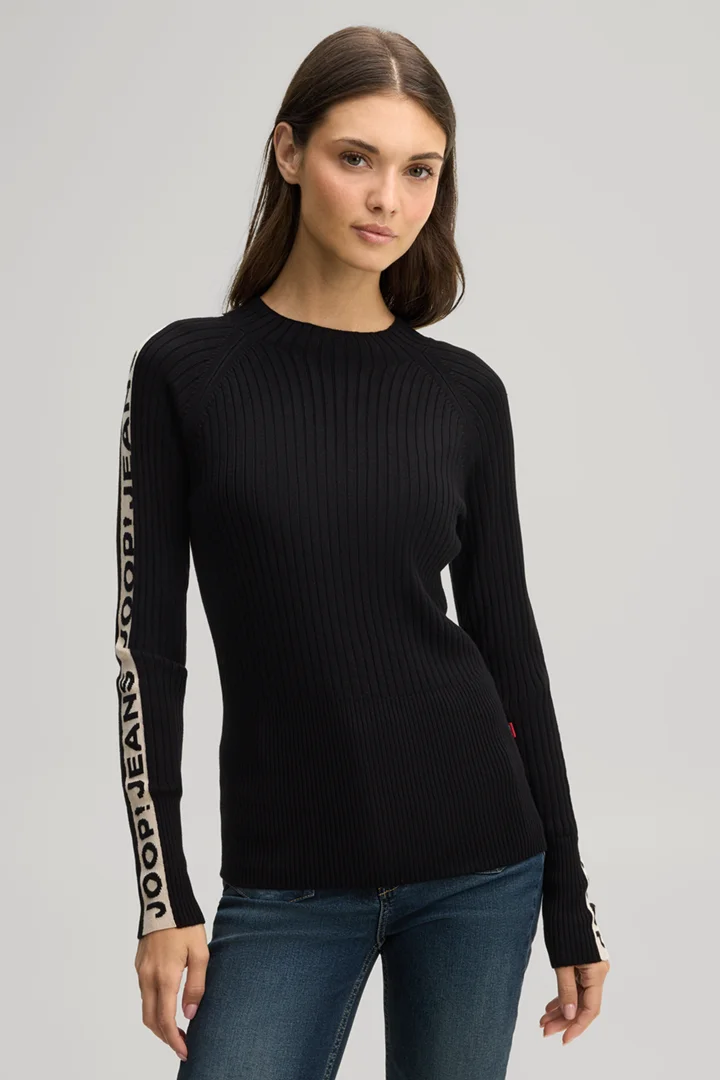 Leads to product detail page "Black patterned viscose jumper with a stand-up collar"