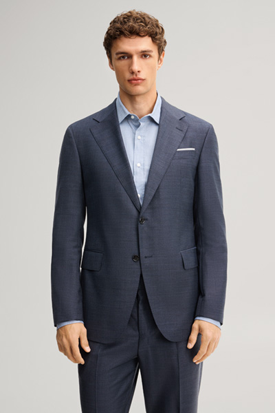 Leads to product detail page "Modular suit jacket in navy, made from virgin wool"