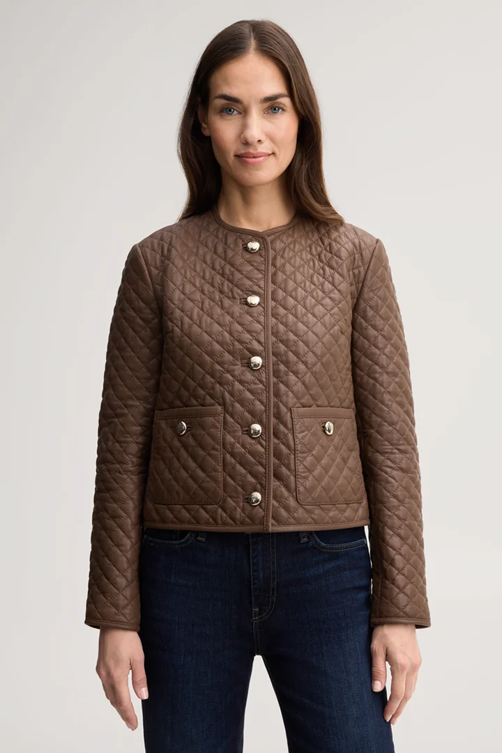 Leads to product detail page "Light brown quilted leather jacket"