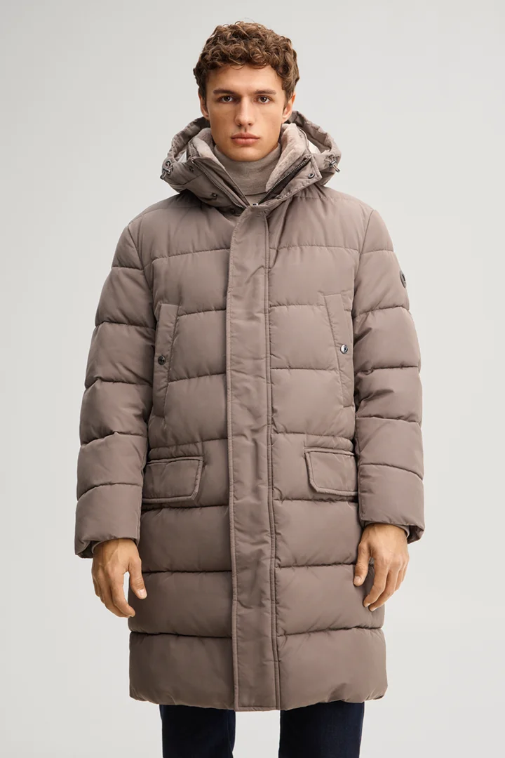 Leads to product detail page "Quilted coat with hood in taupe"