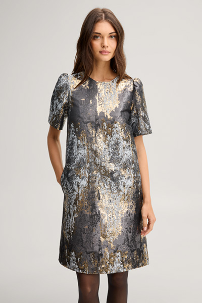Leads to product detail page "Dress with puff sleeves in black, gold and silver pattern"