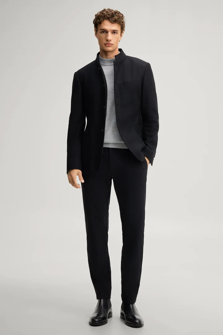 Leads to product detail page "Black suit jacket with a stand-up collar"