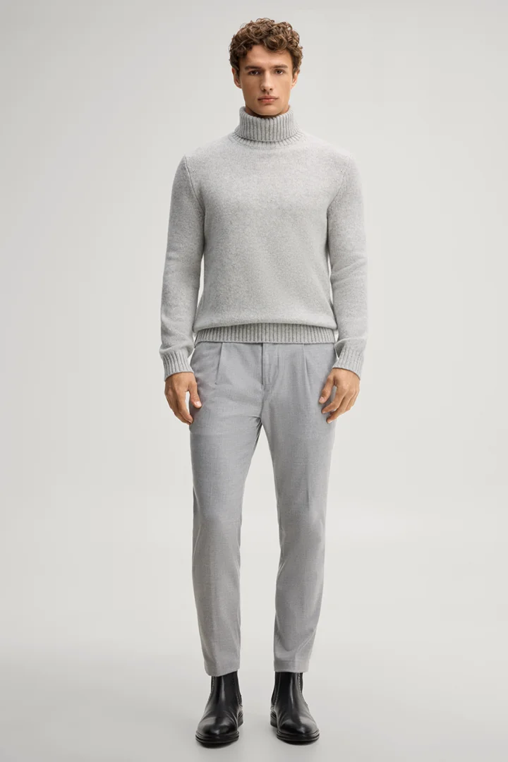 Leads to product detail page "Light grey woollen turtleneck jumper"