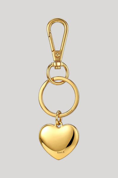Leads to product detail page "Schlüsselanhänger in Gold"