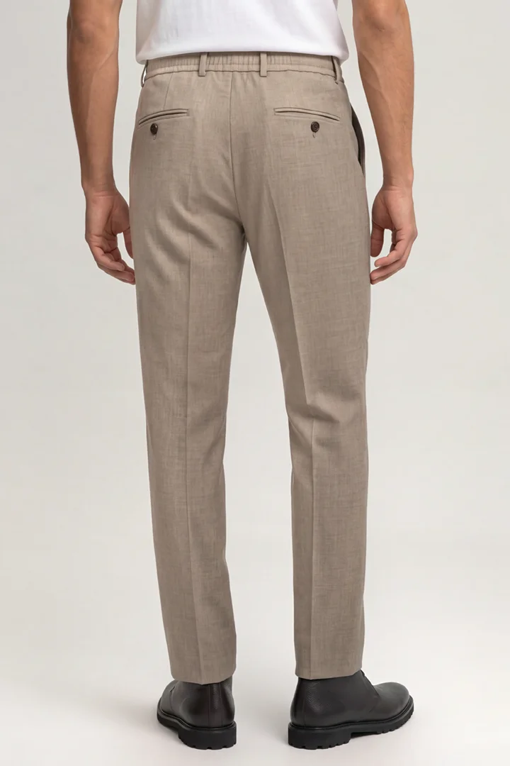 Leads to product detail page "Beige suit trousers"