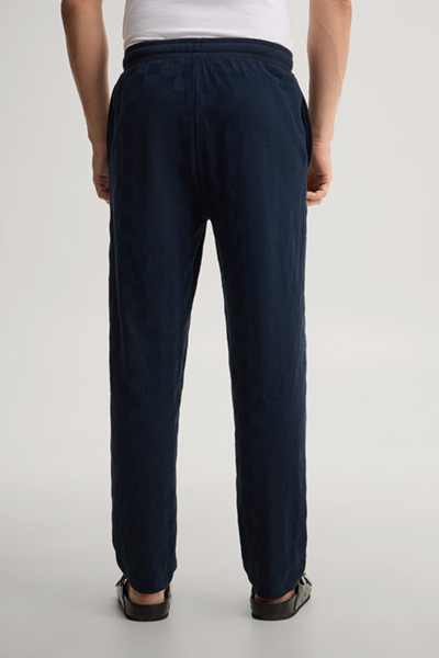 Leads to product detail page "Dark blue loungewear trousers"