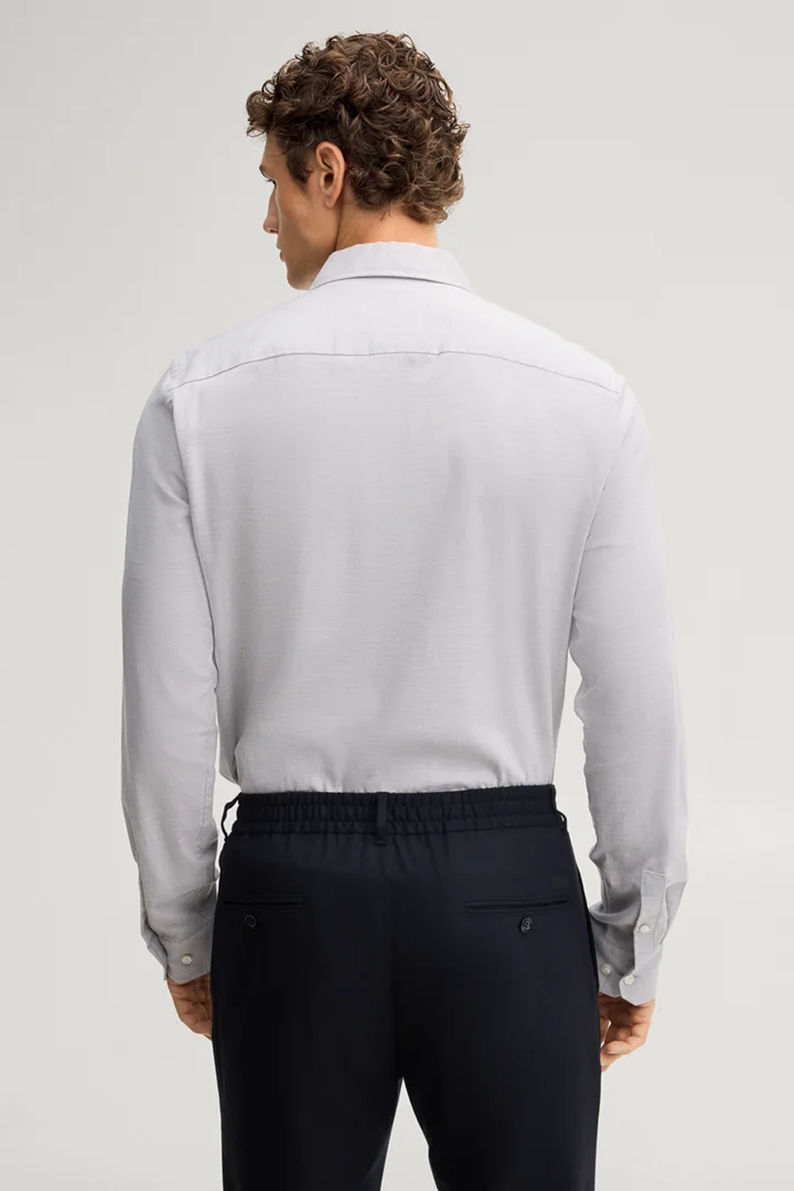 Leads to product detail page "Light grey cotton shirt"