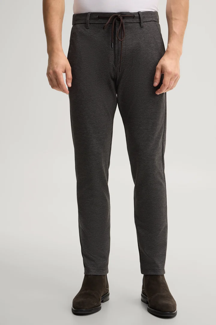 Leads to product detail page "Dark brown viscose-blend chinos"