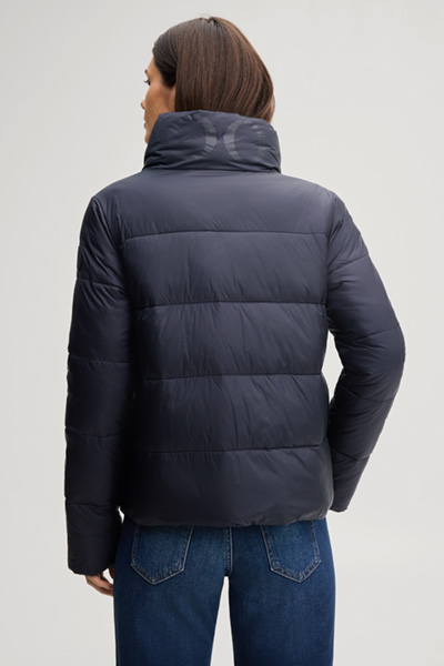 Leads to product detail page "Quilted jacket with a stand-up collar in navy"
