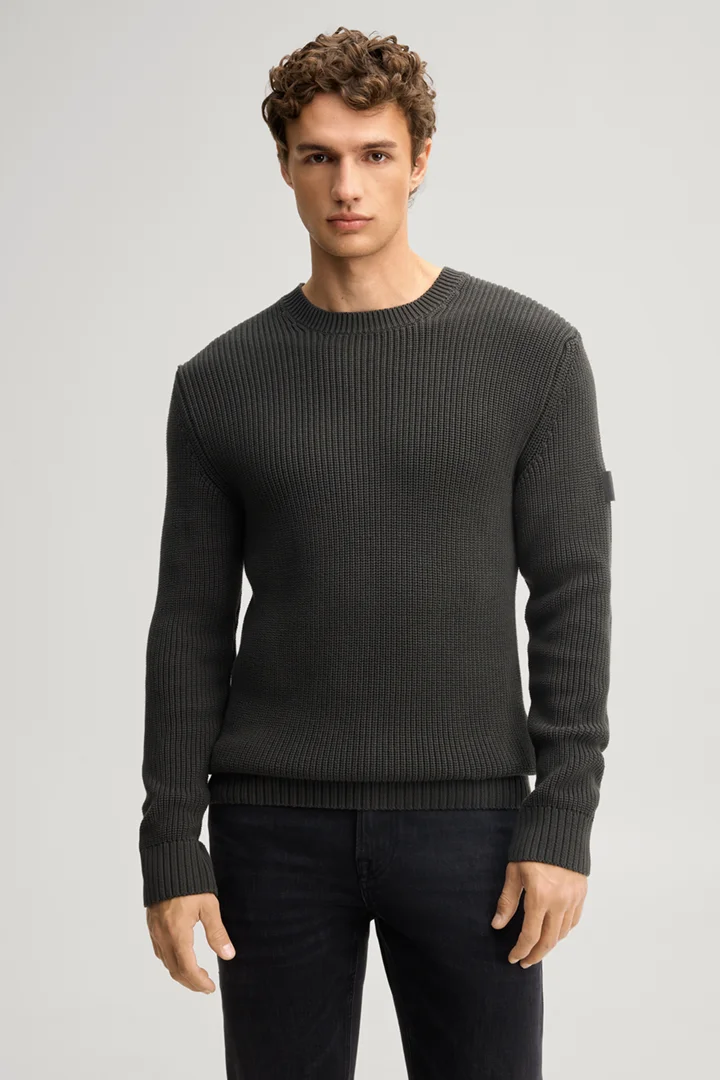 Leads to product detail page "Dark green structured cotton crew-neck jumper"
