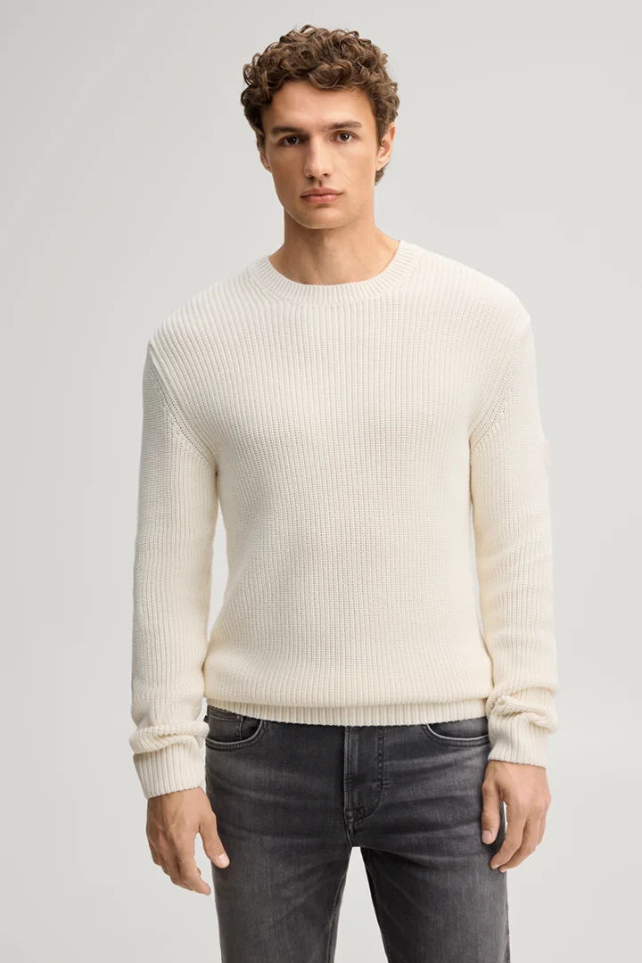 Leads to product detail page "Beige structured cotton crew-neck jumper"