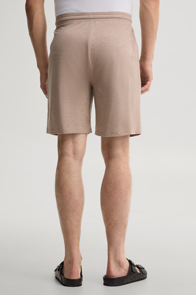 Leads to product detail page "Beige loungewear shorts"