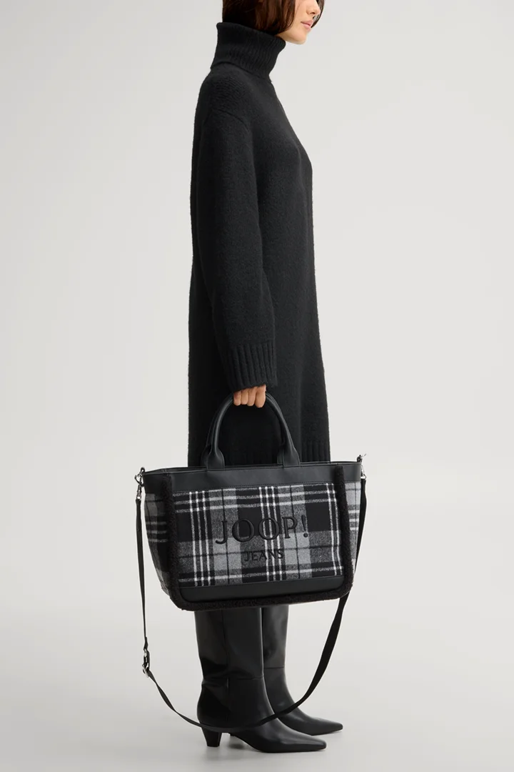 Leads to product detail page "Calduccio quadro yvette handbag in black and grey chequered pattern"