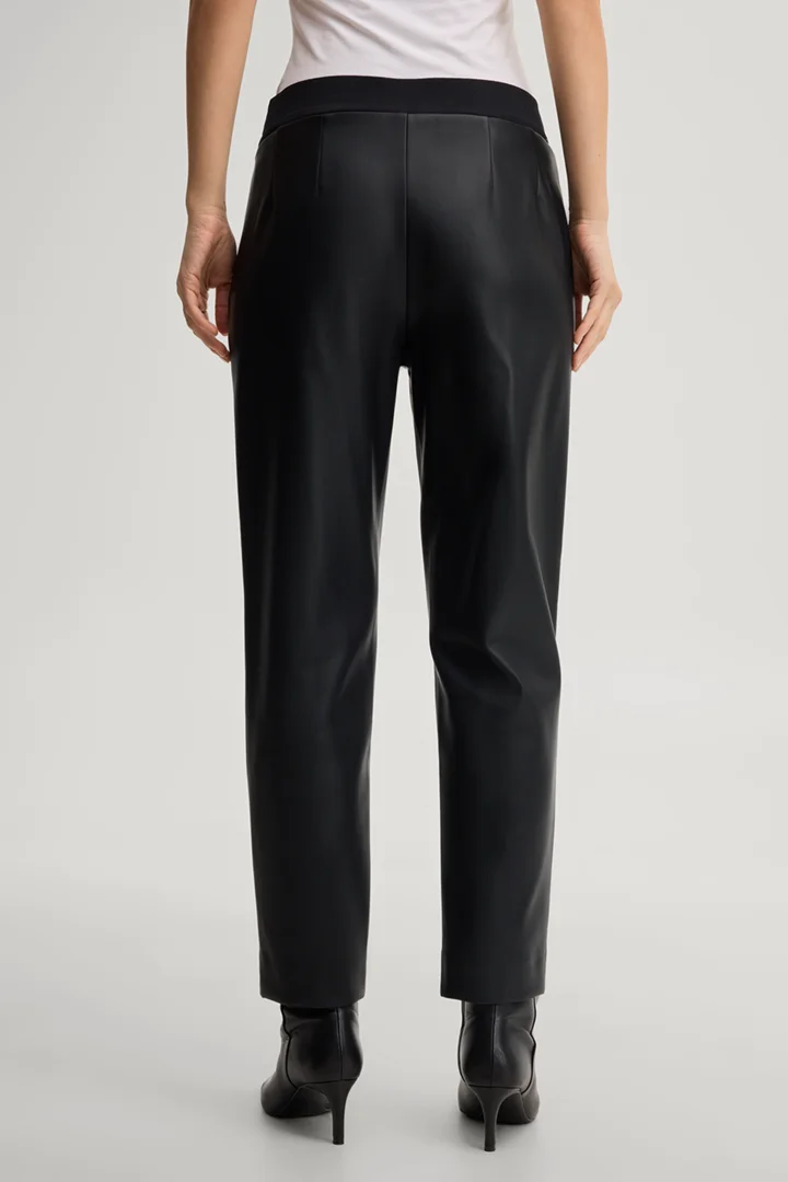 Leads to product detail page "Faux leather cigarette trousers in black"